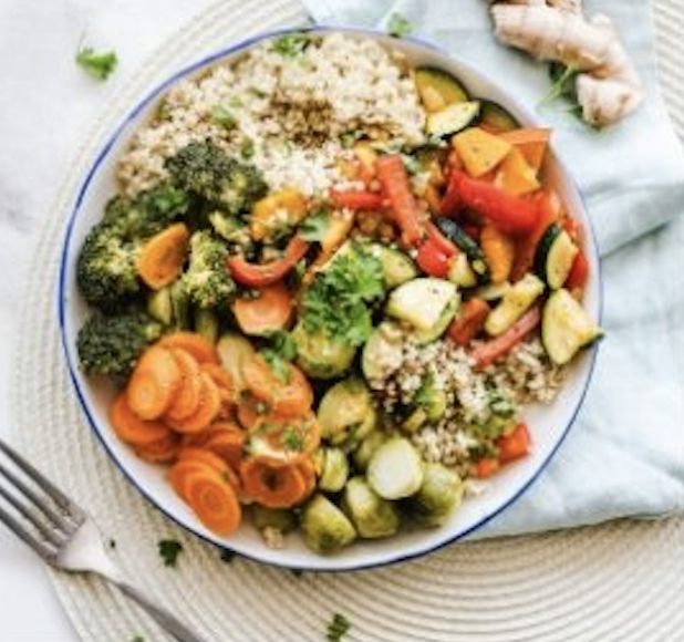 bowl of vegetables with rice and avocado